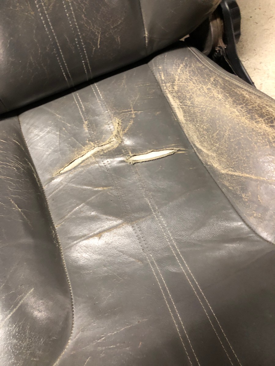 Torn drivers side seat